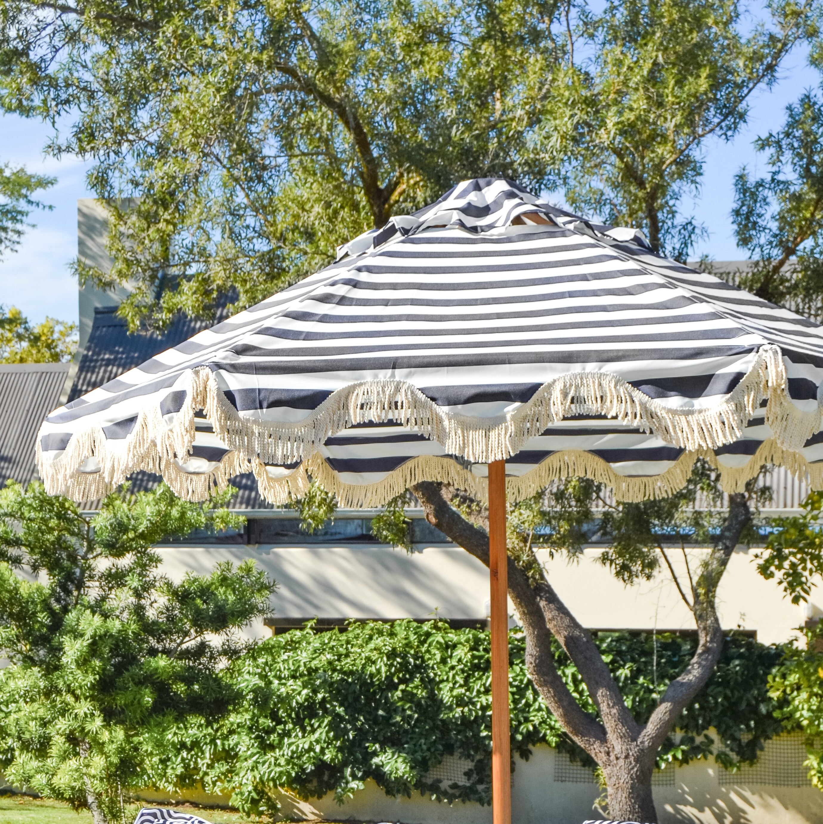 indian fringed patio umbrellas Striped Fringed Patio Umbrella – thatchandshade